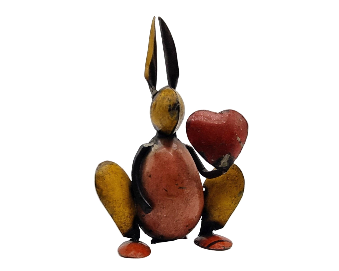 Metal statue of rabbit or hare with heart